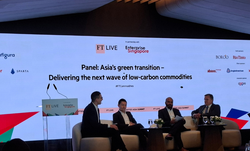 FT Live panel discussion on Asia's green transition and low-carbon commodities at FT Commodities Asia Summit Singapore with four panelists on stage