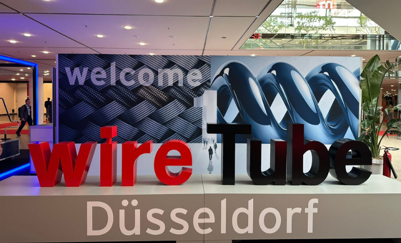 Entrance signage for Wire & Tube Düsseldorf, the international trade fair for the wire, cable, and tube industries, displayed inside the exhibition venue.