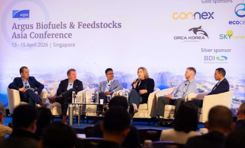A panel discussion taking place on stage at the Argus Biofuels & Feedstocks Asia Conference in Singapore, showing multiple speakers seated on stage with Argus branding and sponsor logos visible on the backdrop.