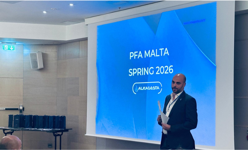 Alkagesta presentation at PFA Malta Conference 2026 showing company branding and speaker session