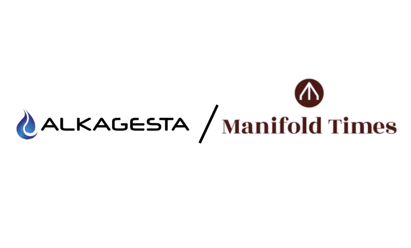 Logos of Alkagesta (with a blue flame icon) and Manifold Times (with a brown circle and stylised M), separated by a slash, on a white background.