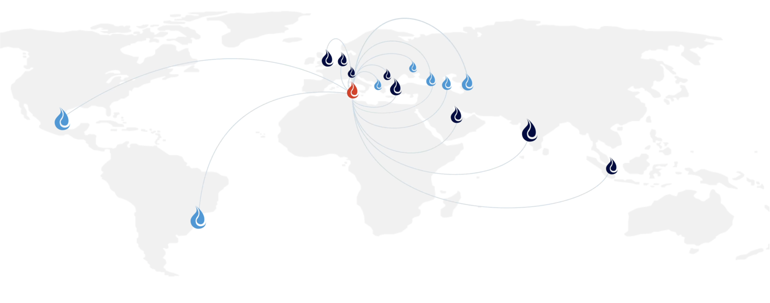 A world map with water droplet icons scattered globally, centred on a red droplet in Europe. Lines radiate from the red droplet to other droplets, illustrating global water connections or distribution.